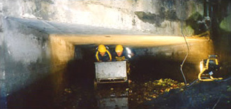 Cleaning out of a very small-size tunnel