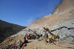 Nailed wall to stabilize landslide on a hillside