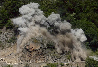 Blasting and earthwork of a rocky outcrop