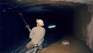 Renforcement de galerie de petite section par béton projeté voie sèche